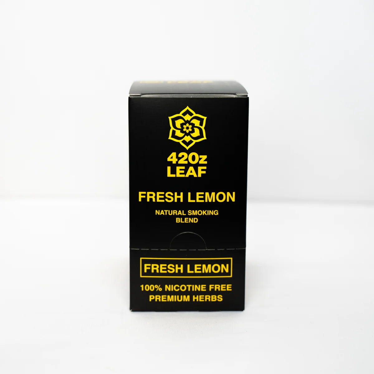 420z Leaf Fresh Lemon Natural Smoking Blend, schwarze Faltschachtel, gelbes Blüten-Logo, Aufschriften „100% Nicotine Free Premium Herbs", weißer Hintergrund